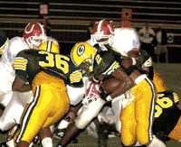 Jacques Williams (2) runs behind Marcus Williams (36) during win over Glencliff