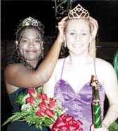 Elaina Hitchner is crowned the 2001 Homecoming Queen by Shasta Miller