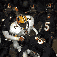 Beech defenders Daniel Jennings and Alvin Futrell drag down Jacquez Williams