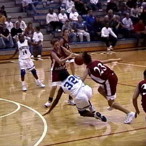 Marshall County- #32 Shanita Mayer and #23 Mariska Reed collide going for the loose ball