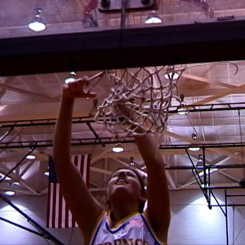 Lawrence Co- Senior Emily Evans cuts the net