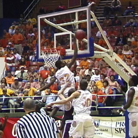 Dyer Co- #32 Perry Powell pins the ball to the backboard