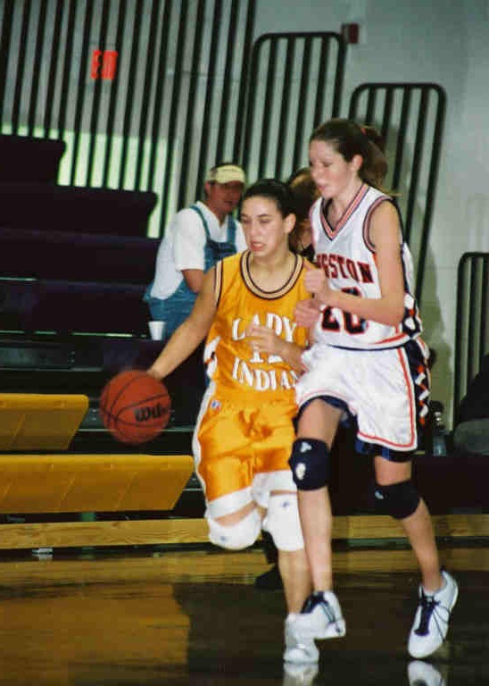 Kingston HS Freshman Rachel Sitzler chasing fast break.