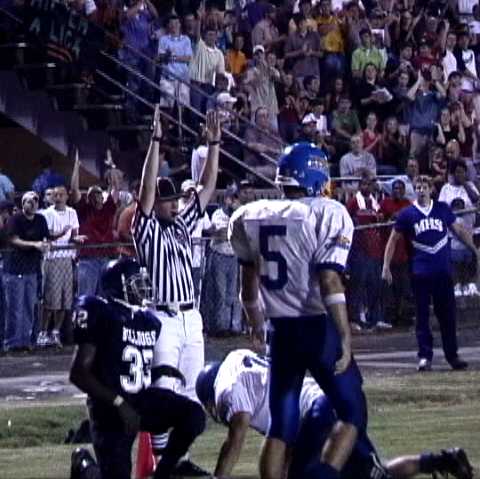 Milan- #32 Rod Smith gives the Bulldogs a 21-7 lead at the half