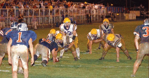 OS QB D.J. Whalen surveys the situation from inside the Kingston 5-yard line.
