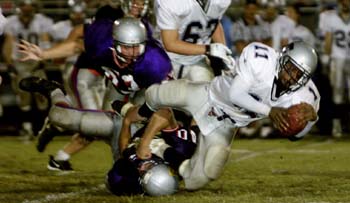 Travada Dixon gaining yardage against the Irish