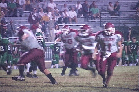 Ernest Williams follows his blockers for one of his 3 TD's of the night.