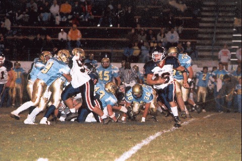 Justin Farley runs for a big gain against Cumberland Co.