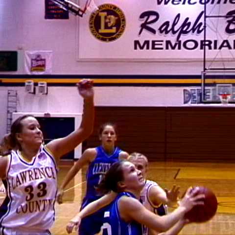 Cleveland- #25 Allison Rader slips along the baseline for two