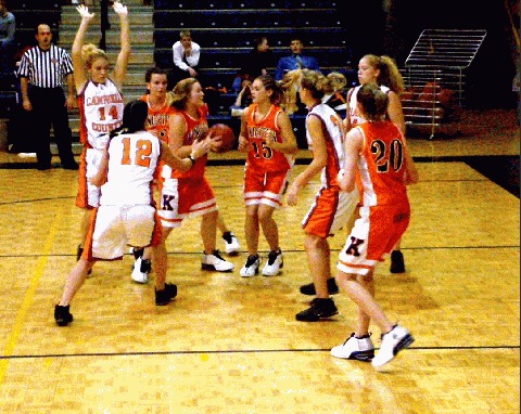 Kingston's Lunsford iunder the basket..