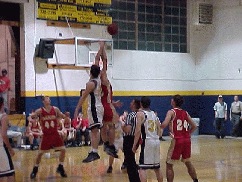 Robbie Tolley going for the ball.