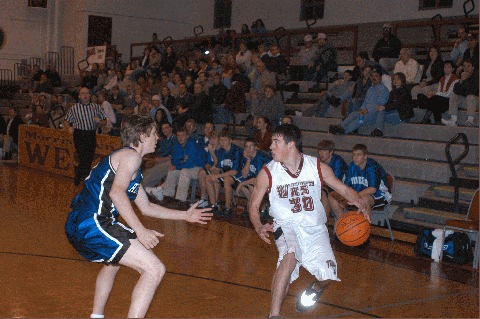 Tim Weatherall (30) looks for help against Matt Day.