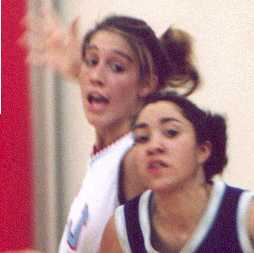 USJ Courtney Alvey wants the ball as JCS Chantel Mangrum defends