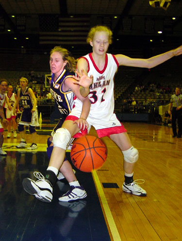 Stacey Jernigan and Mary Beth Berry battle for the ball