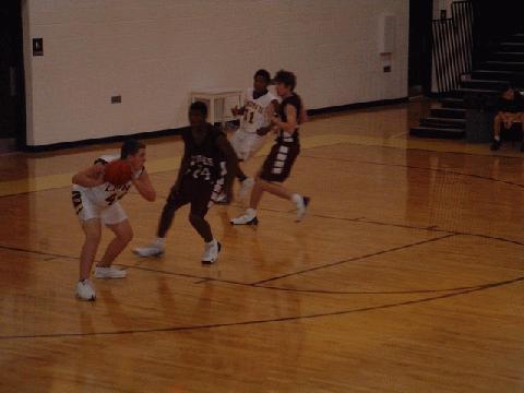 #44 Talley looks for an open man after a steal