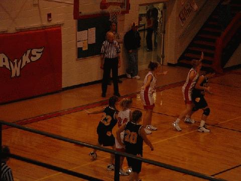 #20 Deltedesco breaking to the middle, while #44 Allen, #23 Boyd post up