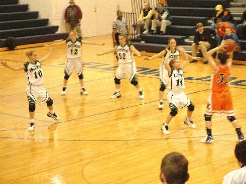Rockwood's Cox guards Kingston's Steffany Pugh.
