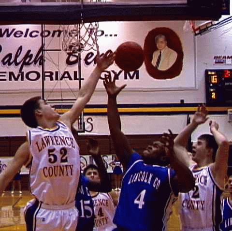 Lawrence Co- #52 Zach Kilburn tips away the rebound