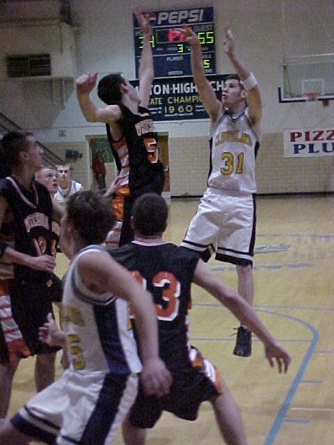 cole gouge shoots over the defence for the highlanders
