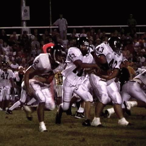 Loretto- #43 Eli Fisher runs the draw as #13 Chris Beckman hands off