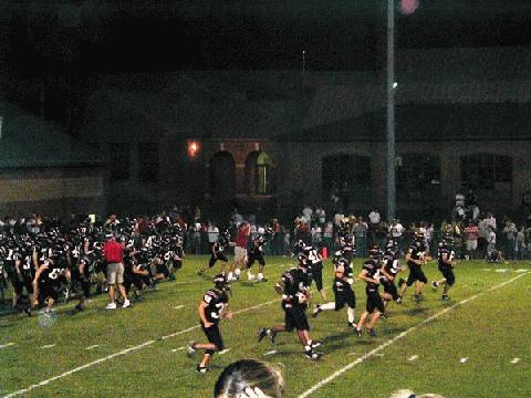 Rebels warm up before the 3rd quarter.