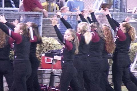 Cavalier Cheerleaders lead the crowd in a cheer