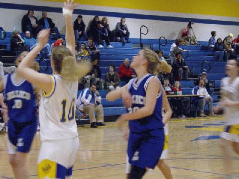 HCHS's Kim Seal gets a basket!
