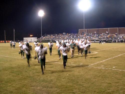 Hornets racing off the field for Halftime, down 7-14