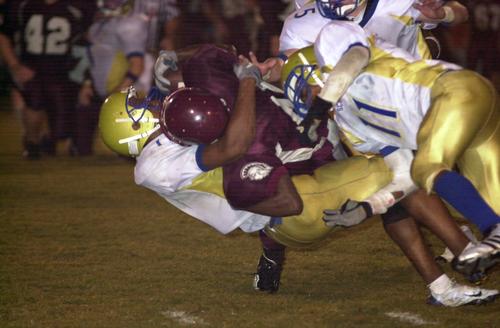 New Image: Aled Marable takes down White Co. running back with help from Matt Johnson #11