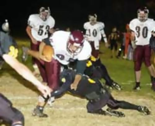 Warrior running back Michael Hollifeld plows ahead in theChuckey-Doak game.  --- photo by Elizabethton Star - Dave Boyd