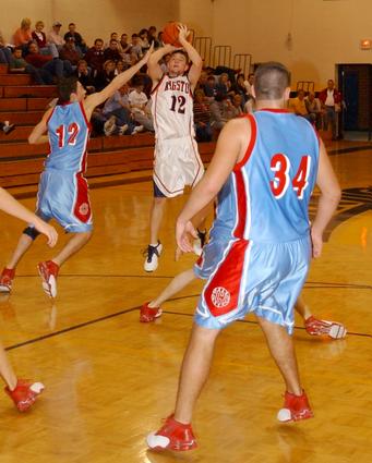 Alan Coley shoots a jumper for Kingston.