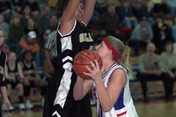 Page's Allison Harmon is defended by Giles County's Robin Leslie