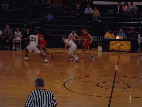 #20 Bumphus & #21 Clark look to trap a C.A. player