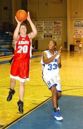 Oakdale's Josh Helton shoots a lay-up.
