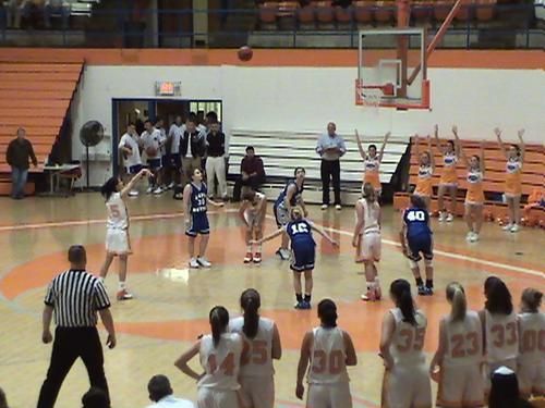 LADY  COUGAR'S #15 SARAH MUNAL SHOOTS FREE THROWS IN THE FINAL SECONDS OF THE GAME...