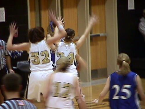 CCHS players #32 Stephanie Rich and #24 Megan Waston work hard to get the ball form Gordansville.