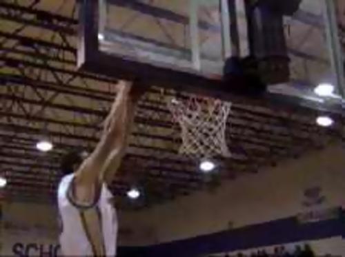 Grundy County's Dustin Fults goes up for the slam in grundy's win over Huntland