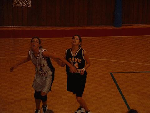 C.A. #14 & Lady Lions' #24 Packwood block out for the rebound