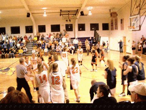 Kingston players celebrate at end of game.