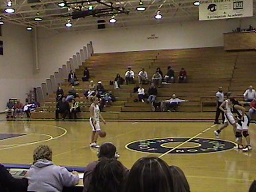 Bulldawg #22 Brook Smith brings the ball down the court.