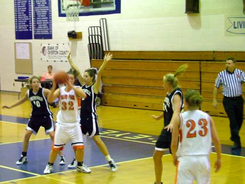 Shanae Rayfield passes to Nora Ramsey