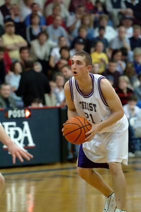 Zach moves the ball downcourt