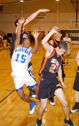 Desmond Gallaher gets fouled on his way to the basket.