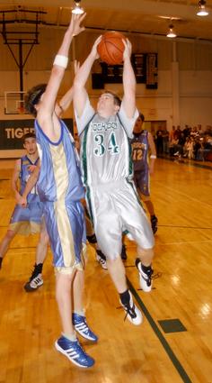 Brian reed goes hard to the basket.
