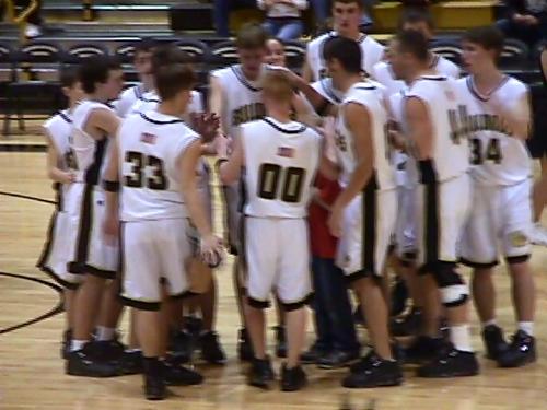 CCHS gets loud in their huddle before the opening tip.