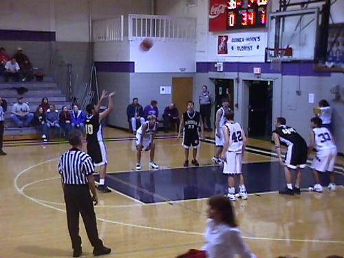 CCHS Senior Chase Stephens (#10) watches his free-throw into the basket.