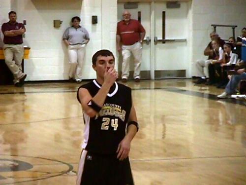 CCHS Senior Dustin Thompson (#24) relaxes before his foul shot.