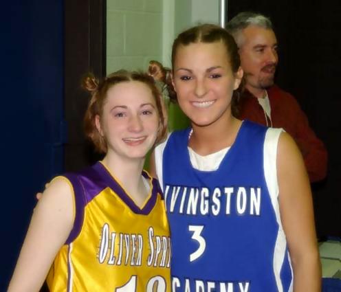 UTC BOUND- Oliver Springs' Laura Hall and Katrina Beechboard share a smile after Friday's semifinal clash. The two were opponents Friday, but will be teammates this fall at UTC.