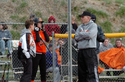 Abbie receiving instruction from Coach Hardin and Amy