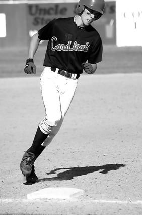 Brighton's Brian Jacobs hits a solo homer in the fifth inning.